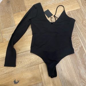 NBD black stretch one arm bodysuit NWT Sz Small